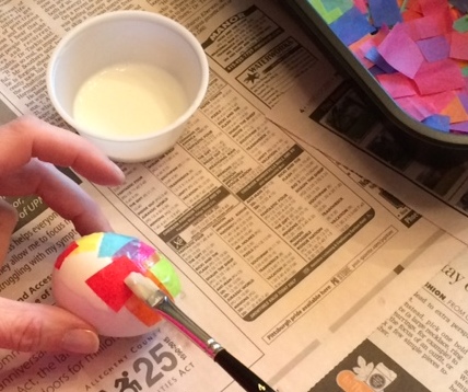 decorating eggs with tissue paper