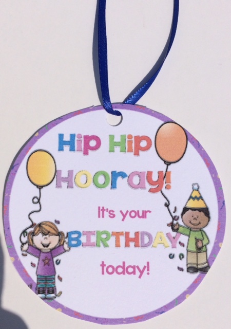student birthday badge and necklace