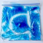 practicing letters of the alphabet with gel bags