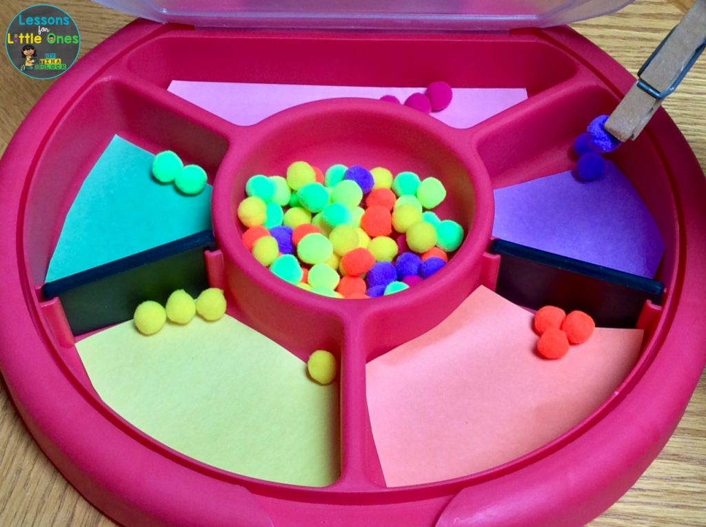 color sorting activity with pom poms & clothespin